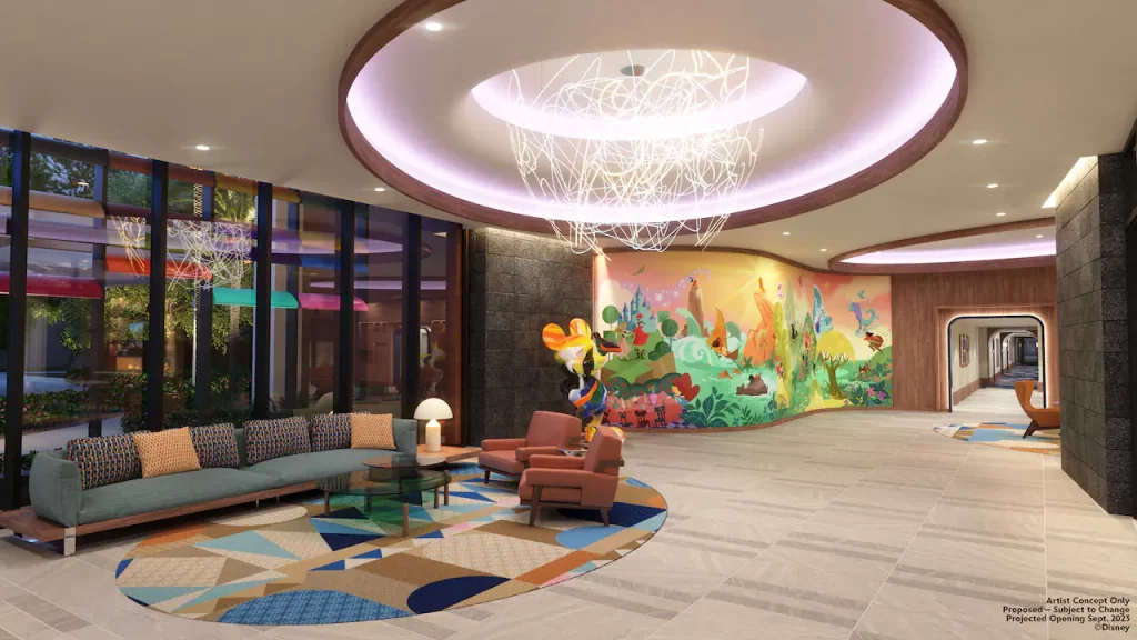 The colorful lobby of The Villas at Disneyland Hotel including a seating area, unique stringy chandelier and a Mickey Mouse statue in front of a character mural by Lorelay Bove.