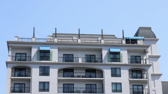 Disney Vacation Club Riviera Resort gray building with balconies
