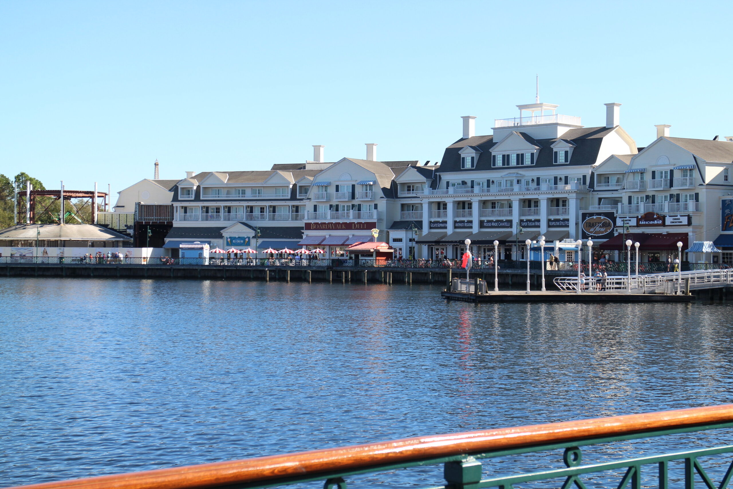 Disney's BoardWalk Resort sits over a day time lake view