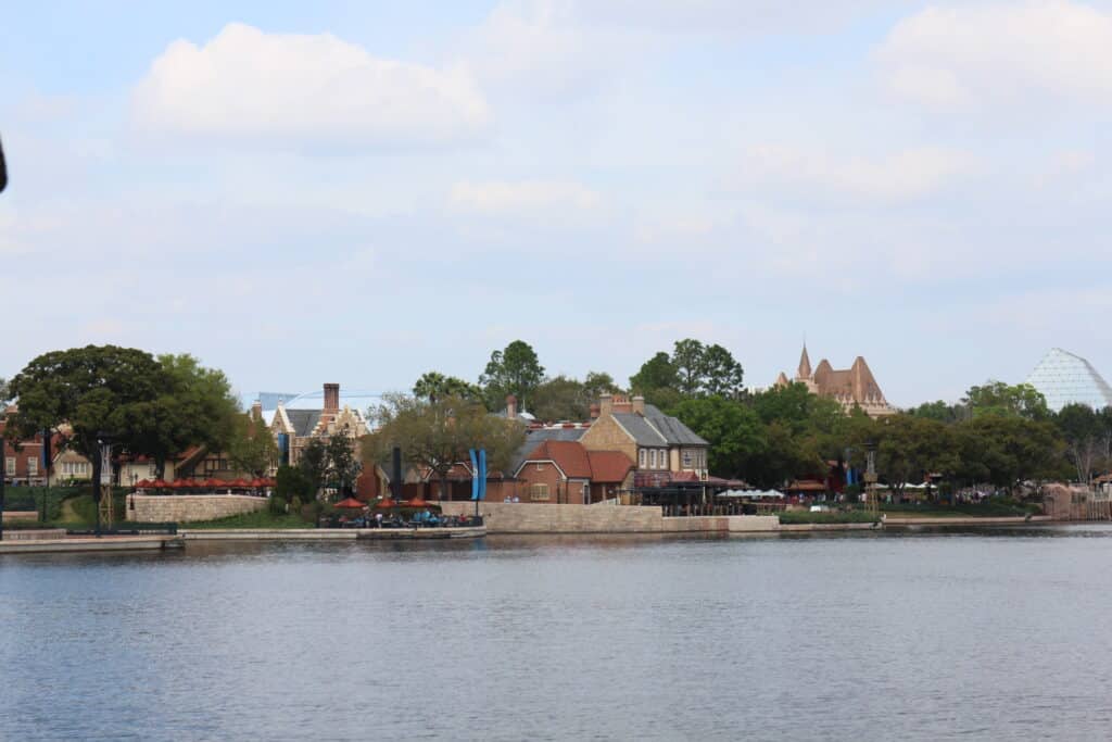World Showcase Lagoon sits still in front of the UK pavilion across the water at Epcot