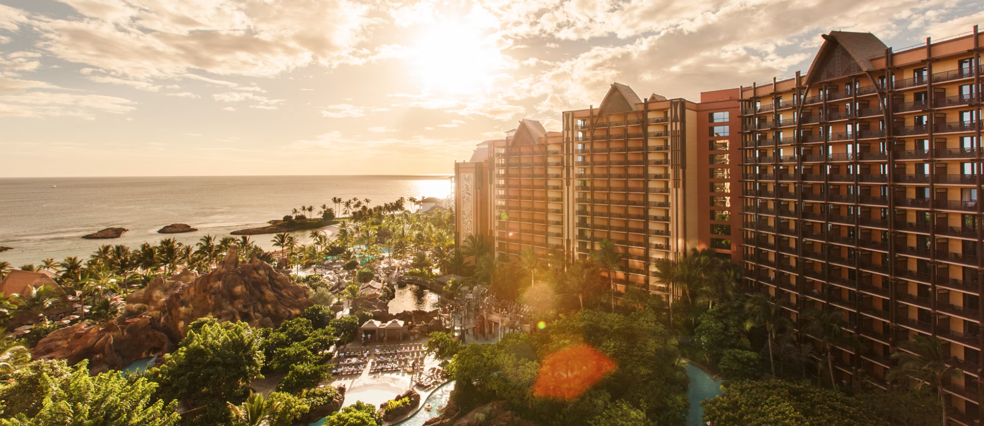 Photo of Aulani building and ocean with sparkling sun from Disney Vacation Club website