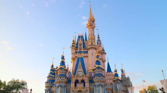Cinderella Castle at golden hour with a blue sky behind it | Disney ROFR DVC July 2023