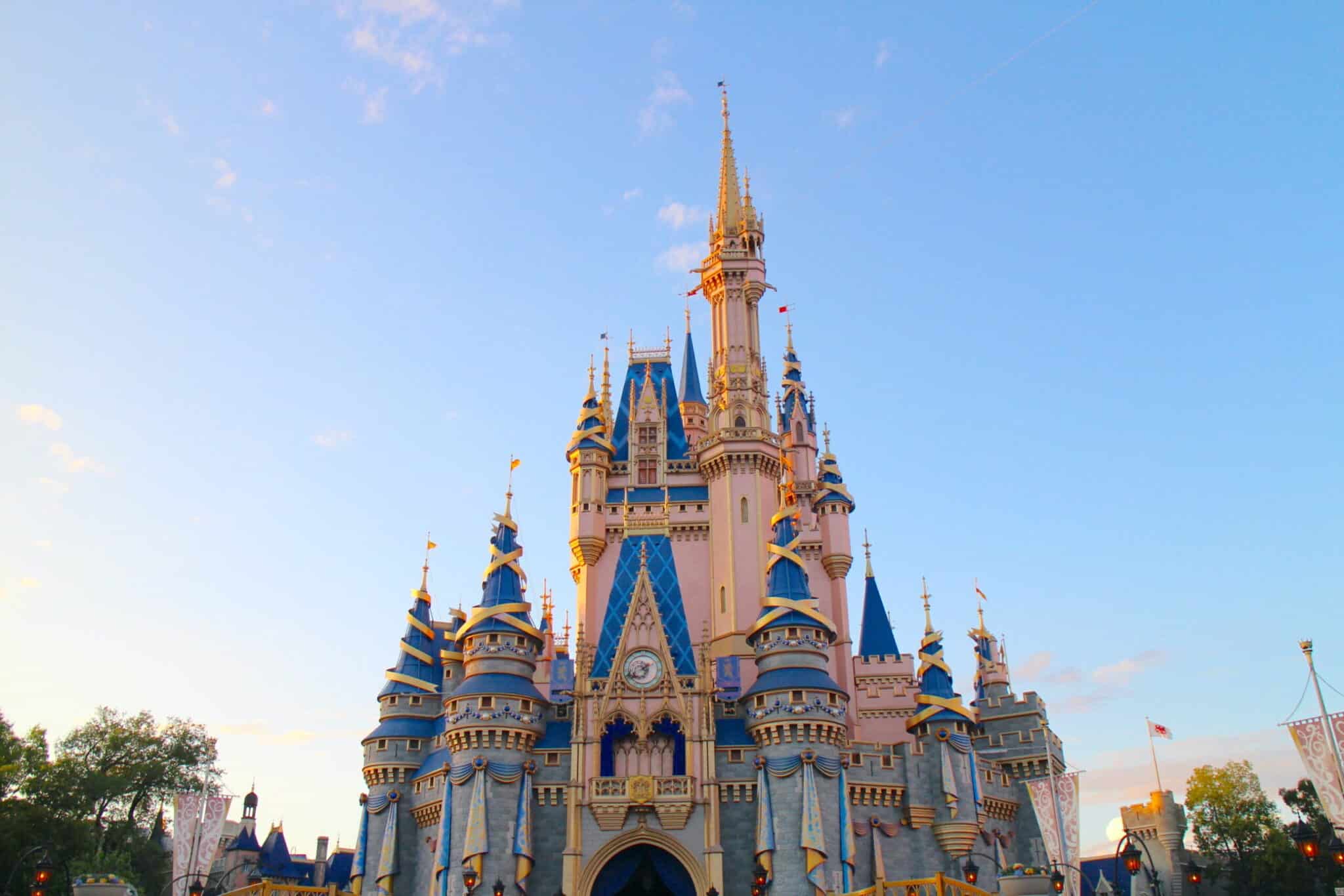 Cinderella Castle at golden hour with a blue sky behind it | Disney ROFR DVC July 2023