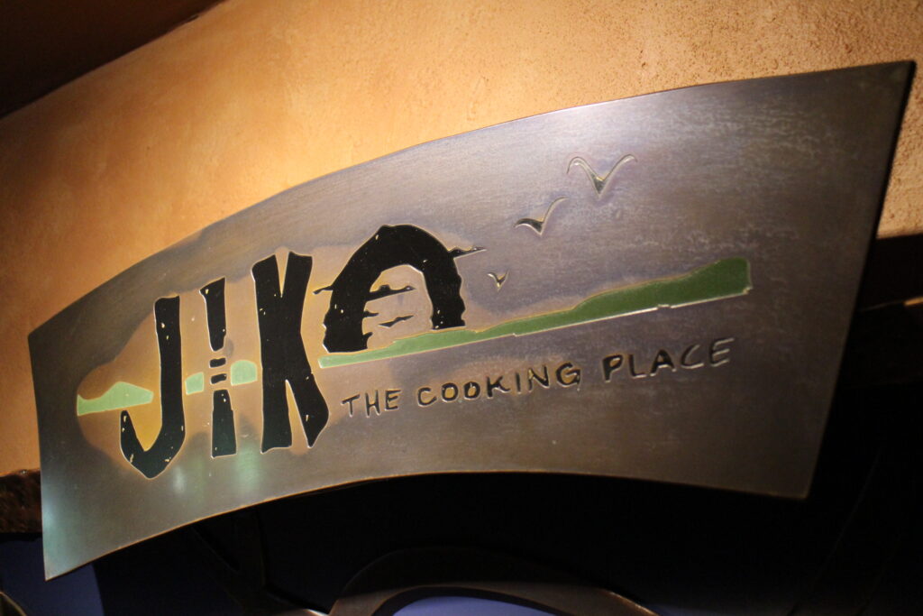 Jiko The Cooking Place restaurant sign, brown 