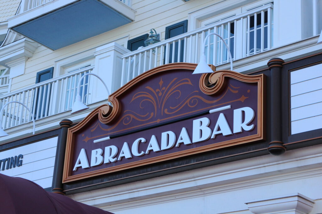 Abracadabar sign with a wand on it