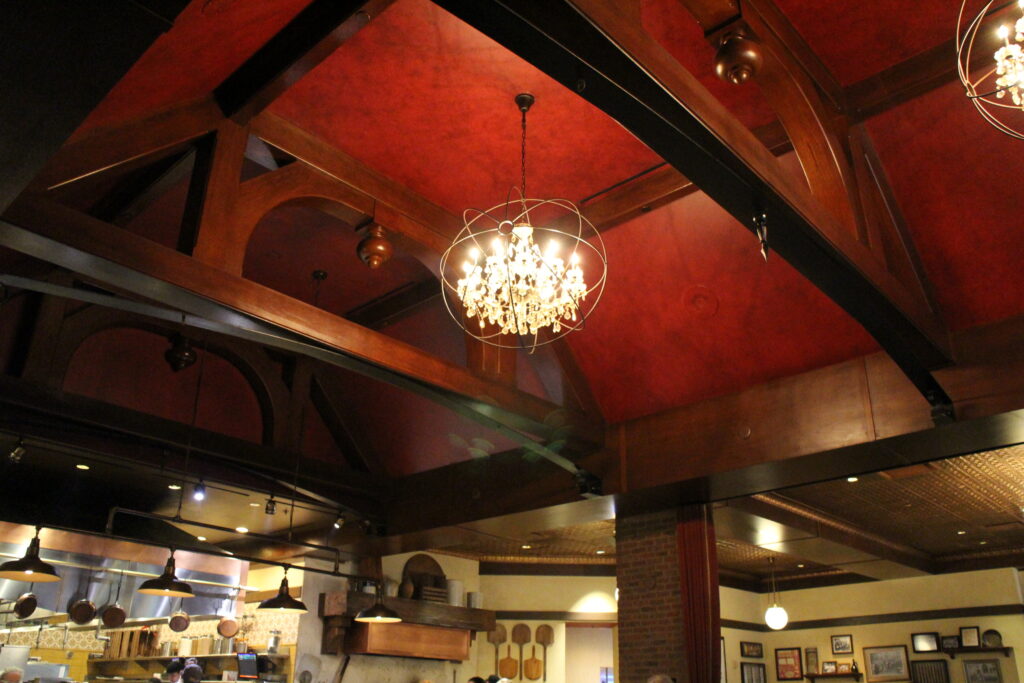 red roof with wood beams inside Trattoria al Forno at Disney's BoardWalk