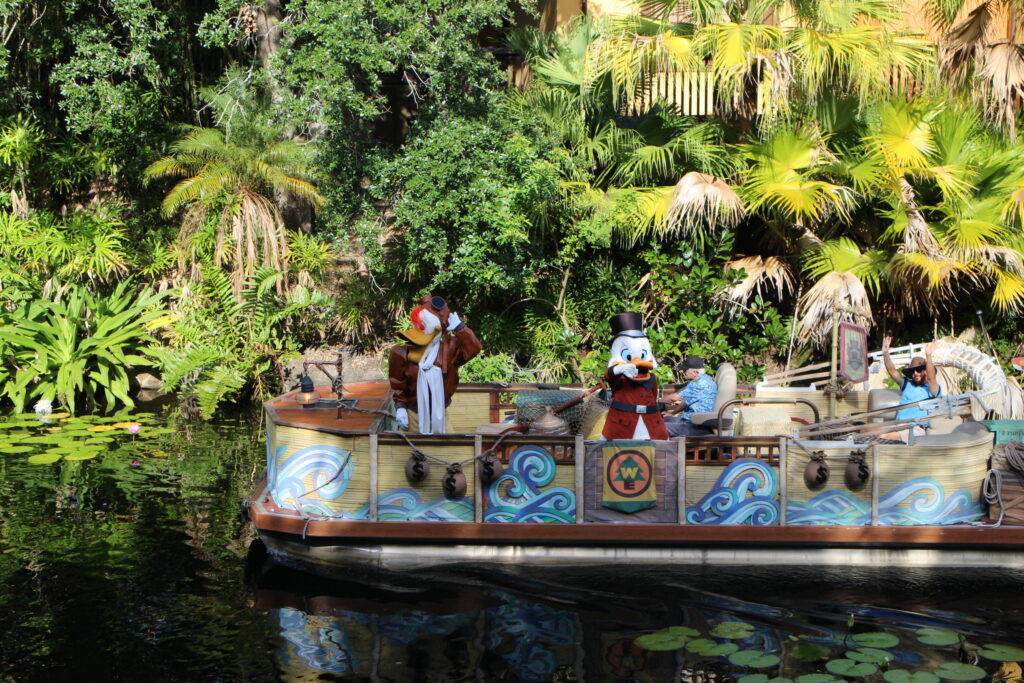 Disney characters Launchpad McQuack and Scrooge McDuck on a boat at Animal Kingdom