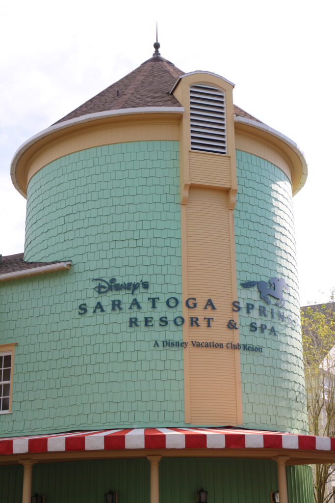 A round teal building that says Disney's Saratoga Springs Resort and Spa