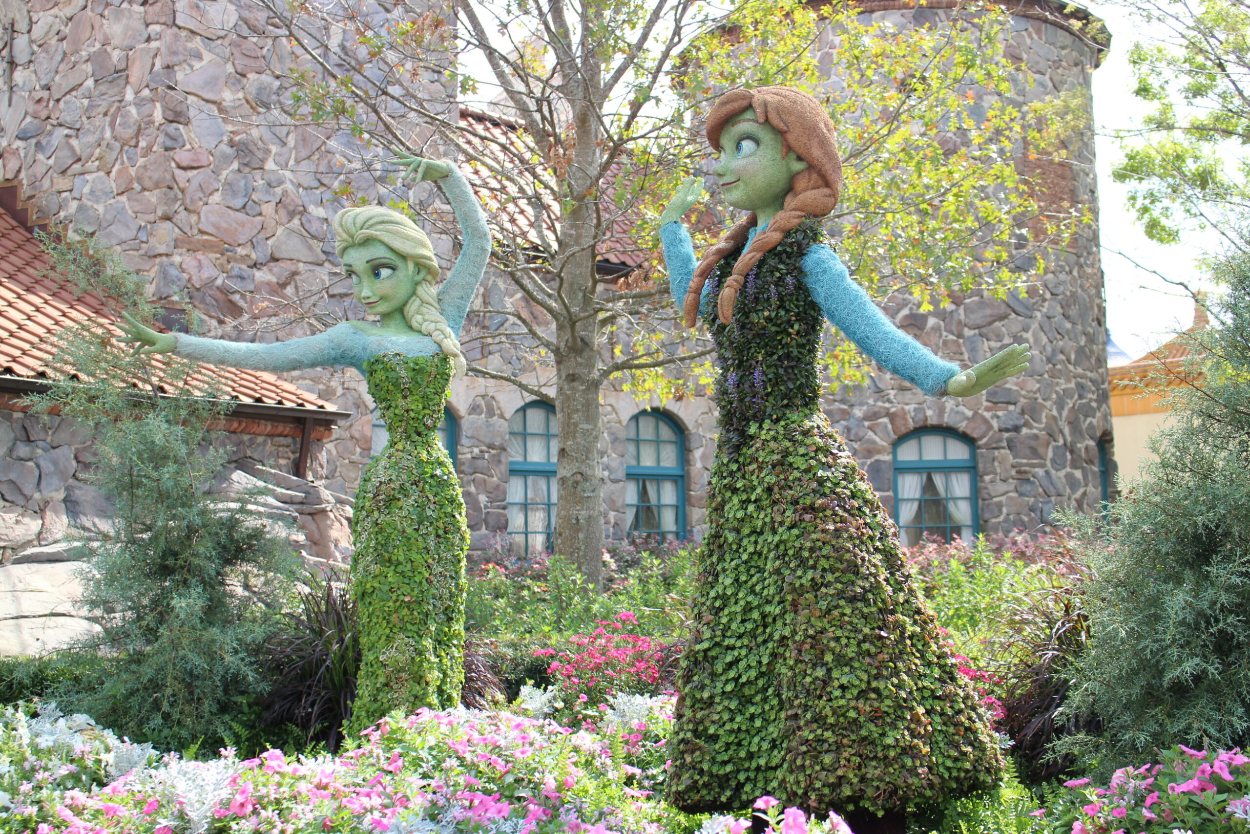 Epcot Flower and Garden Elsa and Anna From Frozen Topiaries in Green