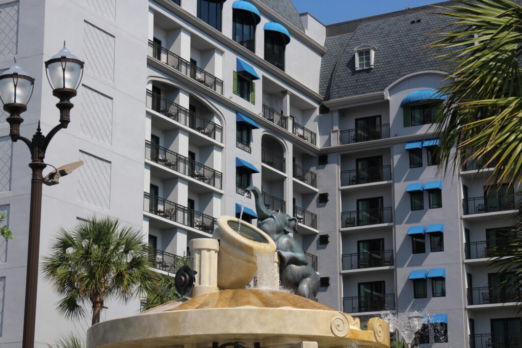 Riviera's gray resort balconies surround a elephant water fountain