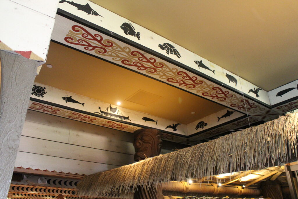 Island style illustrations line the ceiling at Tambu Lounge, a popular stop on any Disney Monorail pub crawl