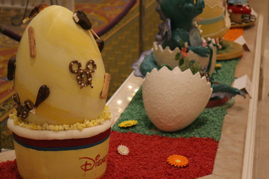 A Grand Floridian Easter egg inspired by Disney Parks treats like churros, Mickey pretzels and popcorn.