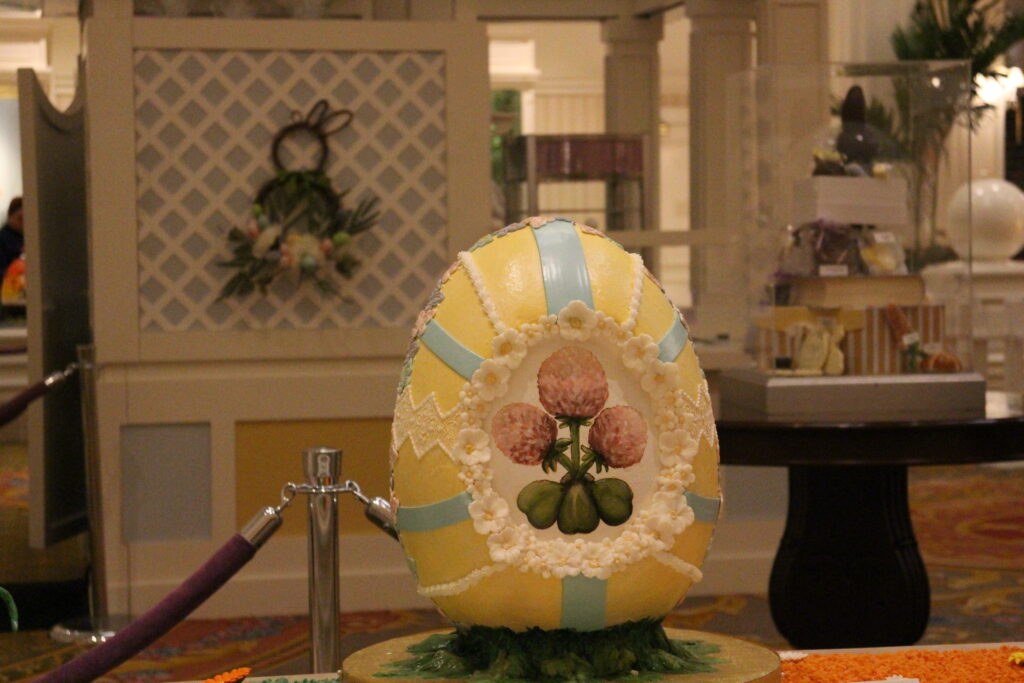 A pastel Grand Floridian Easter egg with flower art on it.