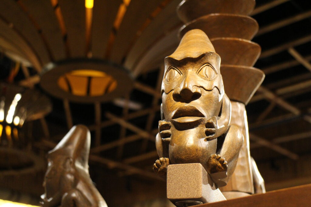Brown and wood looking Polynesian decor statues at Disney's Polynesian Village Resort