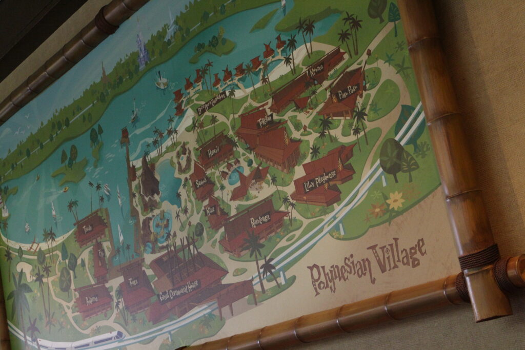 Disney's Polynesian Village Resort map art with a bamboo frame.