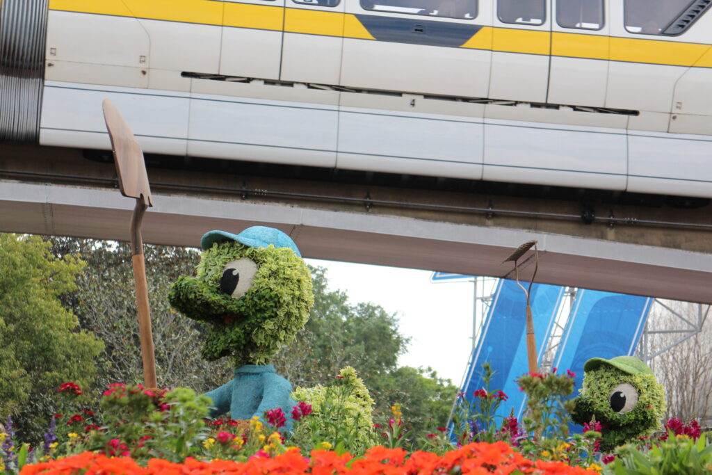 Disney duck topiaries and a yellow monorail.